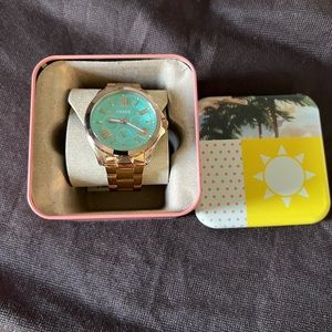 Fossil rose gold watch.